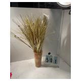 Cups of assorted gold picks