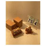 Ear in a cradle and bear on a rocking horse