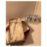 2 silver crosses with doves