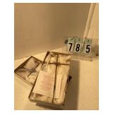 1 silver and 1 gold cross with doves