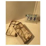 1 gold and 1 silver cross with hearts