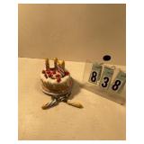 Birthday cake and 6 spoons