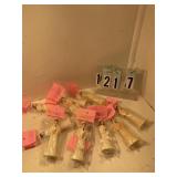 11 assorted white graduates