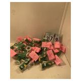 Assorted green graduates