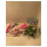 Pink and blue flowers with green leaves