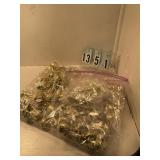 Lots of gold goblets and cross cupcake picks