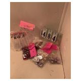 Assorted jems and champagne bottles