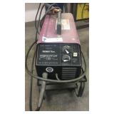 Small wire feed welder with cart and tank