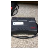 Battery backup surge protector