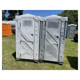 Pair of single synergy world portable toilets