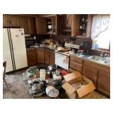 Kitchen appliances pots band and dishes