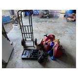 Power tools, gas cans, and moving dolly