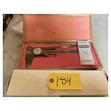 Slide ruler and craftsman caliper Slide ruler and craftsman caliper