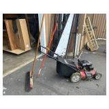 Huskee lawnmower and push broom