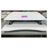 ADJUSTABLE RISING DESK TOP