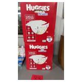 2 BOXES OF HUGGIES SIZE 3 DIAPERS