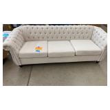 BEIGE TUFTED NAILHEAD TRIM SOFA