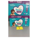 2 BOXES OF PAMPERS DIAPERS SIZE 5