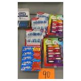 LOT OF TOOTHPASTE, TOOTHBRUSHES & RAZORS