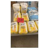 8 PACKS OF DOMINO SUGAR & 1 PACK OF FLOUR