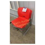 LOT OF 7 RED STACKABLE PLASTIC/CHROME CHAIRS LOT OF 7 RED STACKABLE PLASTIC/CHROME CHAIRS