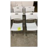 LOT OF 4 WHITE LIFETIME FOLDING PLASTIC CHAIRS