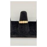 14K GOLD RING W/ CZ STONES SIZE 7 14K GOLD RING W/ CZ STONES SIZE 7
