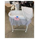 NEW DELTA CHILDREN ROLLING BASSINET
