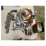 Tools, grease, jumper cables, funnels, misc.