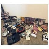 CDs, Records, Headphones, Radios, Guitar Picks,