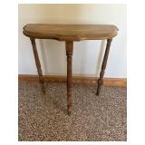 Scalloped edge wall table