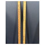 2 advertising yard sticks