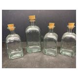 4 green glass bottles w/corks