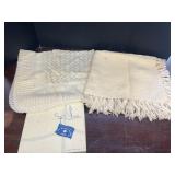 2 baby blankets.  The Belgium Shawl cream knit in