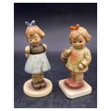 2 Hummel figurines, bows have been repaired on