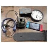Wall clock, DeWalt charger, digital stream box