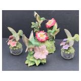 4 hummingbird figurines.  Tallest is 6in & music
