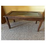 Glass top storage coffee table