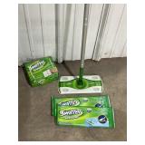 Swiffer Sweeper with a couple wet & couple dry