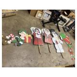 5 Christmas yard decorations.  3 have stakes.