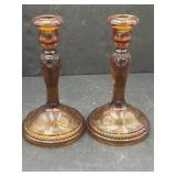 Pair of Tiara Amber Sandwich Glass candlesticks