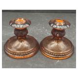 Pair of Tiara Amber Sandwich Glass candlesticks