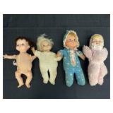 4- 10' String Pulled & Wind Up Dolls