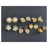 7 Pair Of Gold Tone Clip On Earrings