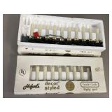 2 boxes of Hofertï¿½s Twinkle Candle light sets,