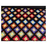 Multi Colored Crocheted Granny Square Afghan