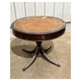 Dark wood drum table w/leather top & brass feet,