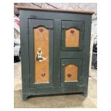 Green-painted rustic storage cabinet w/hand