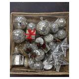 Variety of silver mirrored ornaments