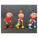 3 wood skier ornaments, 3.25in., missing ski on 1.